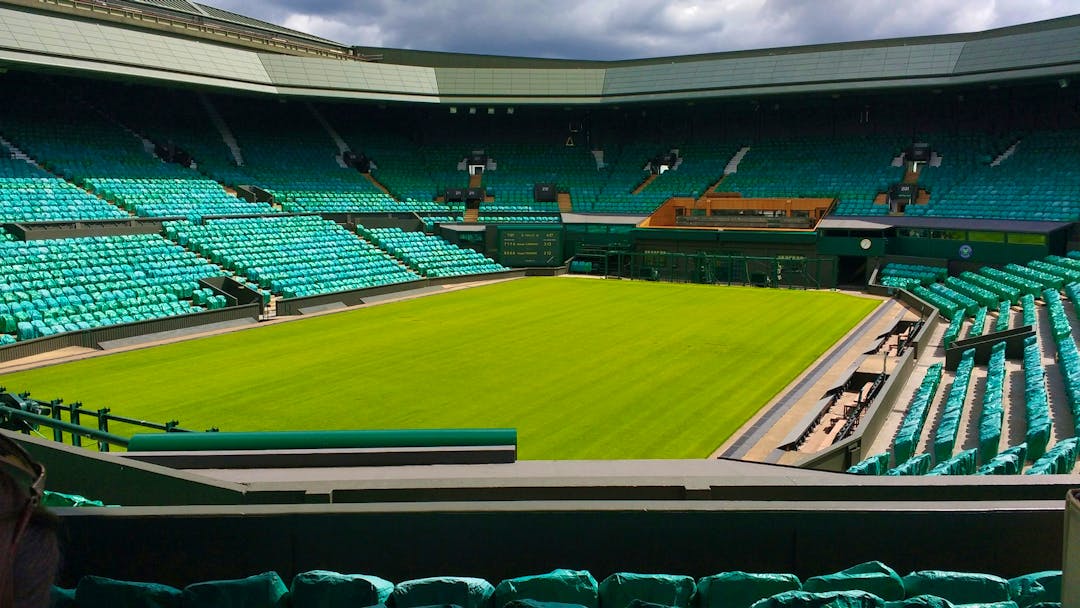 A view of Wimbledon's centre court while empty, showing the serenity before the the chaos begins.